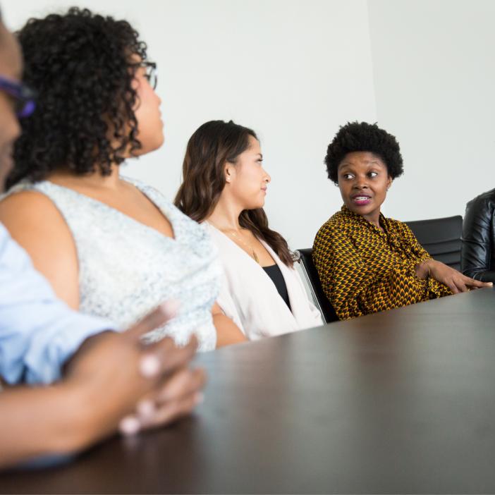 people at boardroom table